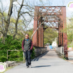 Jordan Poss walks on the Rail Trail.